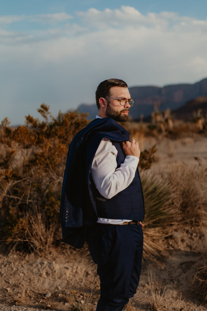 Groom after elopement ceremony with Santa Elena canyon in background