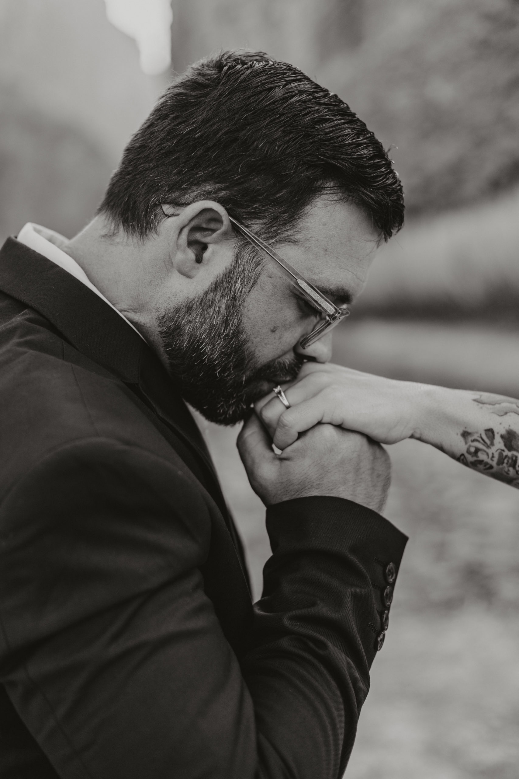 Groom kissing brides hand in Big Bend