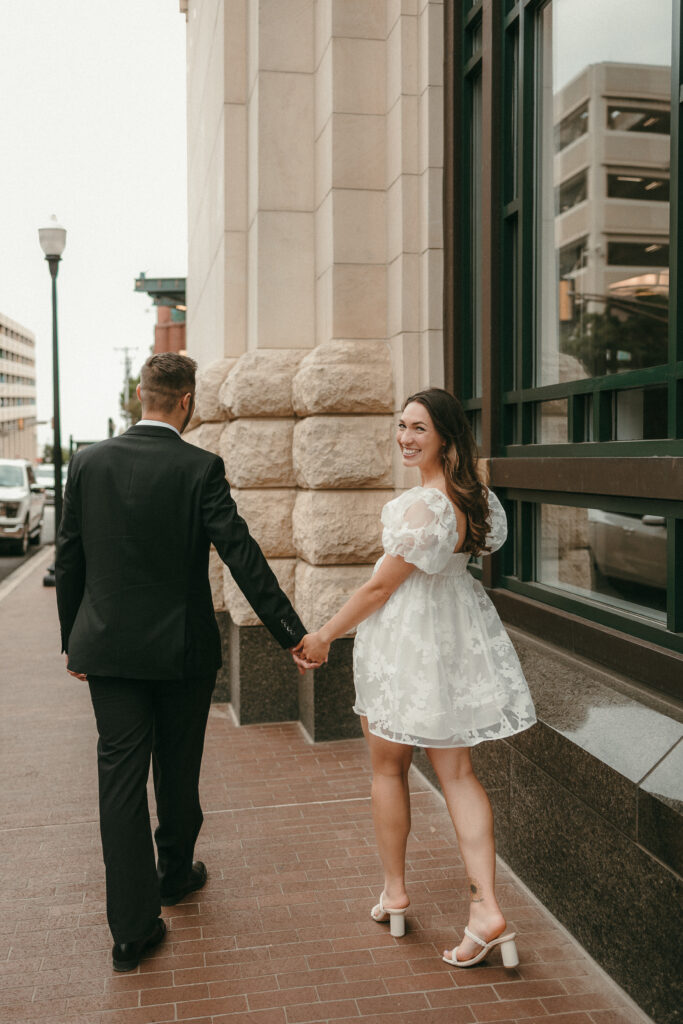 Couple walking in Sundance Square